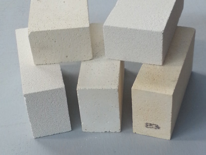 Refractory and insulating bricks